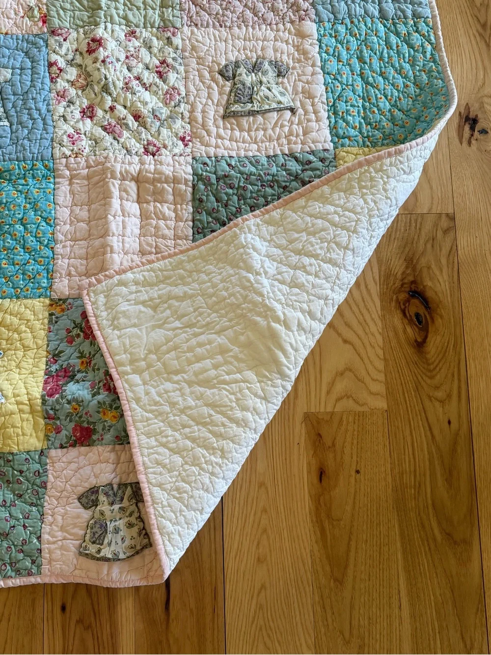 Land Of Nod Patchwork Baby Quilt in Pastel Blue, Pink, Yellow, Cream